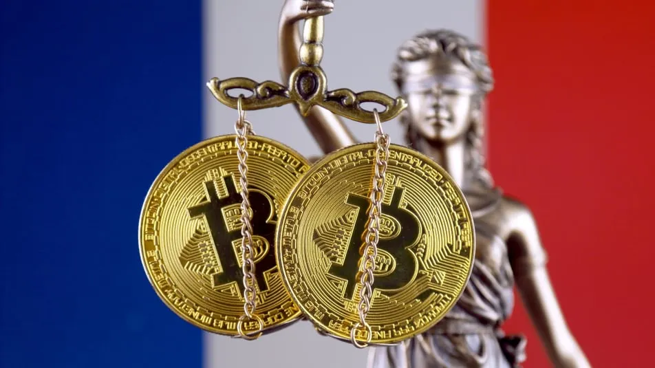 Lady Justice dangling Bitcoins on French flag background. Image: Shutterstock.